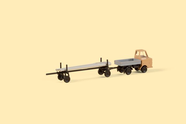 Auhagen - 44658 - Multicar M22 Pritsche mit Langmaterialanhänger (Bausatz)