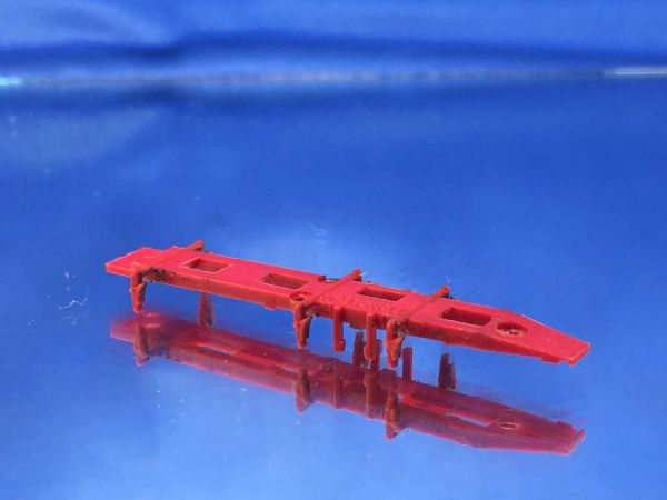 Arnold BR 96 - 2275-17 - rear axle holder red (Used / refurbed)